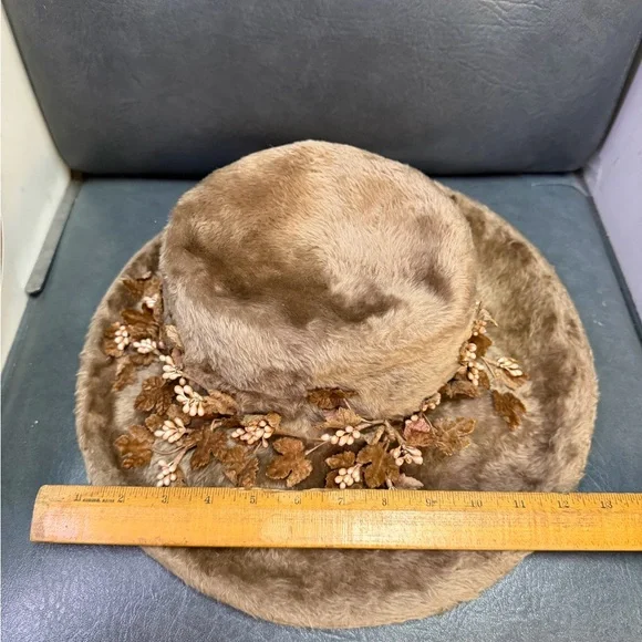 Elegant Faux Fur Hat with Floral Accents